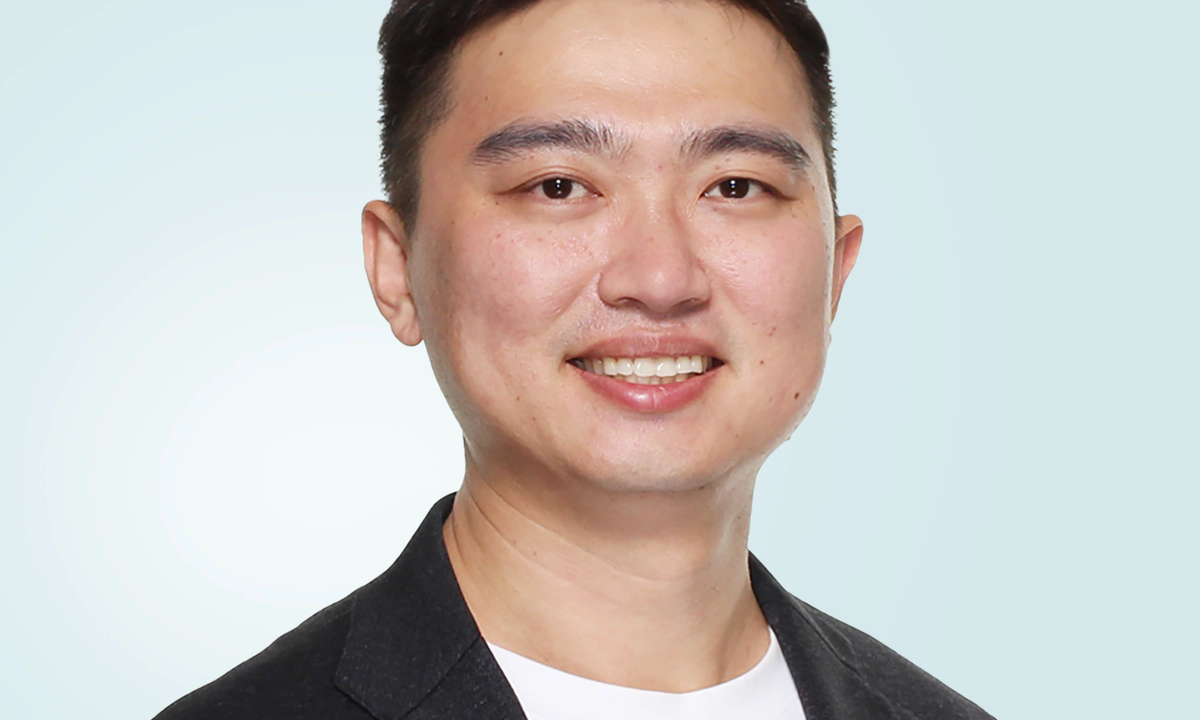 Jay Shen, an asian man with short black hair, and CEO of Transreport, in a grey suit, facing the camera. Jay Shen, an asian man with short black hair, and CEO of Transreport, in a grey suit, facing the camera.