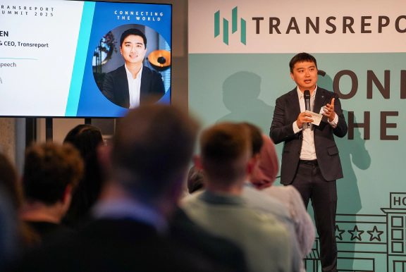 Transreport employees smiling at the camera
