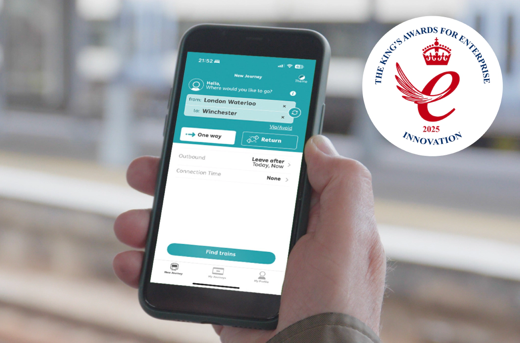 King’s Awards for Enterprise 2025 Innovation emblem are displayed. On the left, a teal background with Transreport logo in white and the King’s Awards for Enterprise 2025 Innovation emblem are displayed. On the right, a person uses the Passenger Assistance app on a smartphone to plan a train journey from London Waterloo to Winchester.