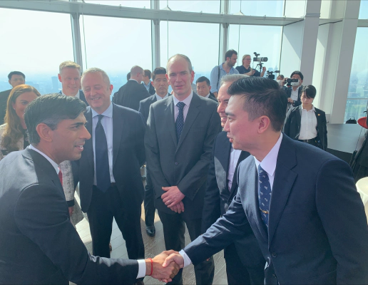 Jay Shen, CEO of Transreport, shaking hands with Rishi Sunak, Prime Minister of the United Kingdom, at the G7 2023 summit.