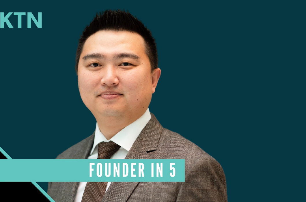 A picture of Transreport founder Jay Shen wearing a grey suit, in front of a dark turquoise and black plain background. The top left of the image has the UKTN logo in light turquoise colour, and a light turquoise banner spans the image at the bottom reading 'Founder in 5'.